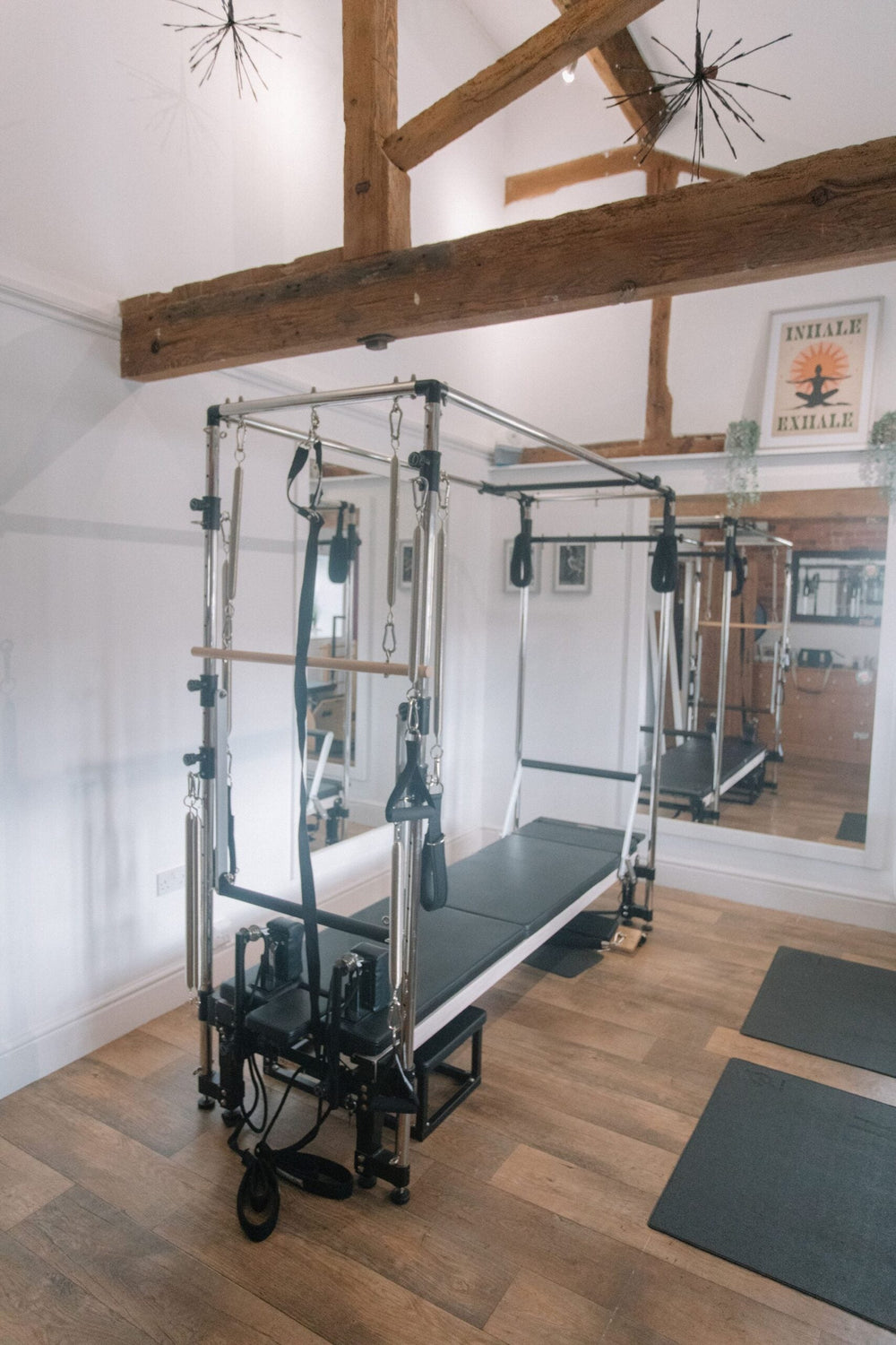 A Pilates Cadillac trapeze table in the studio in Lamport, Northampton